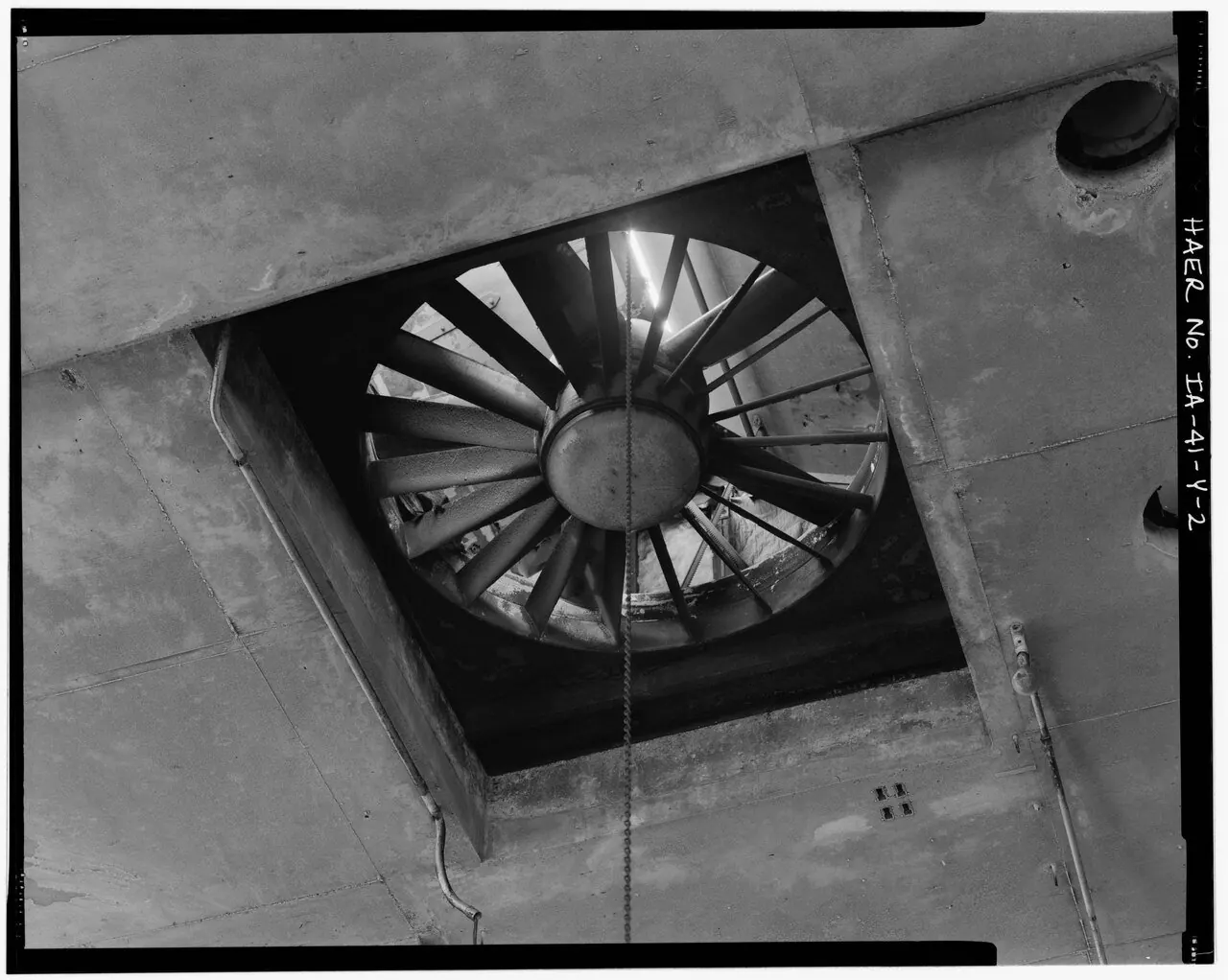 Industrial ceiling-mounted exhaust fan used to pull out steam
