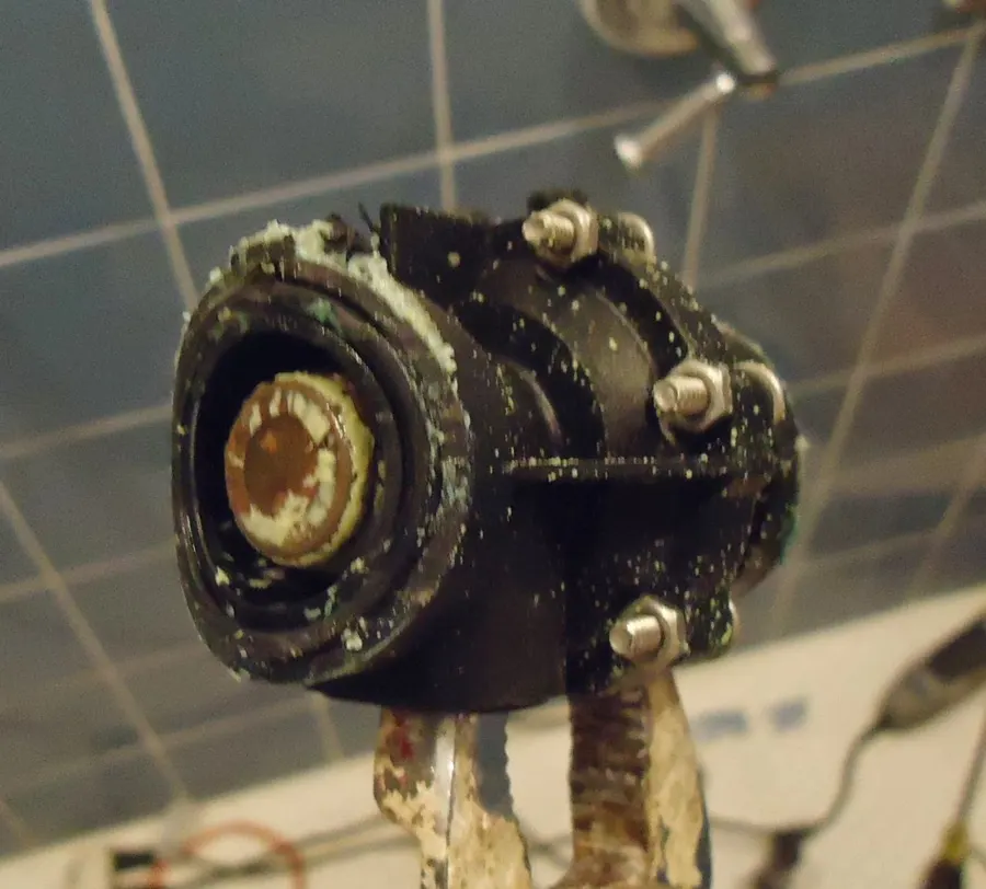 Old shower diverter valve body removed for replacement