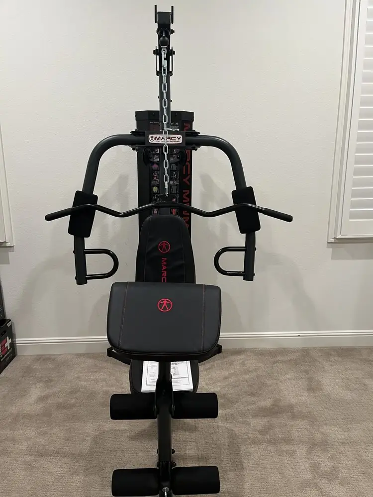 Home gym machine assembled in a spare room